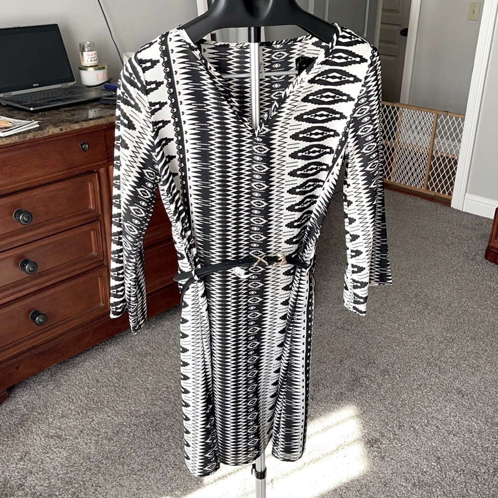 Lizard Thicket, black & white dress with sleeves.